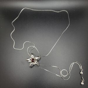 Silver Floral Pendant Necklace with Garnet Accent